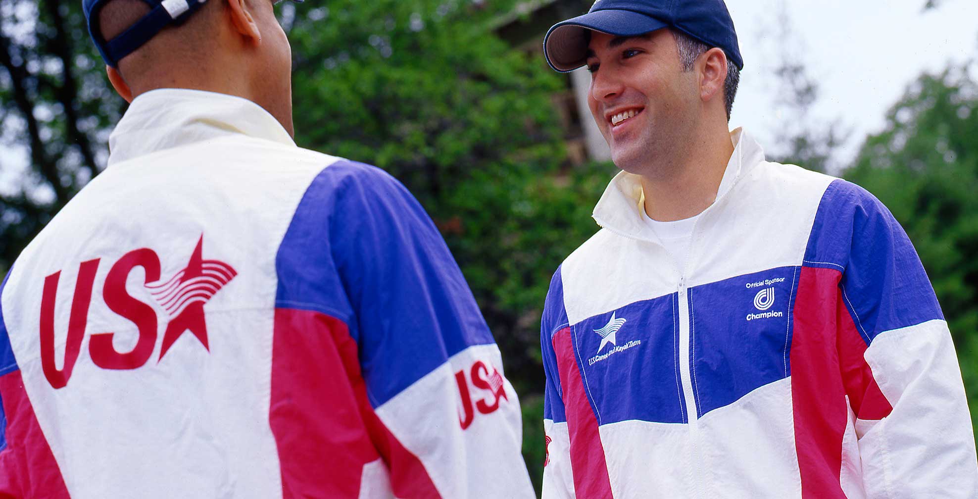 us_canoe-and-kayak-team_2-men-wearing-jackets.jpg Art Direction by: Bart Crosby, Crosby Associates